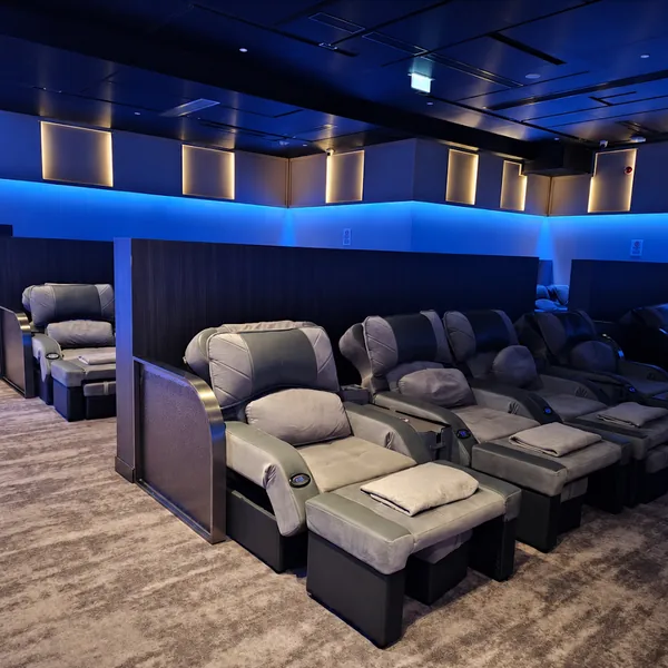 Blue-lit recliner lounge photo