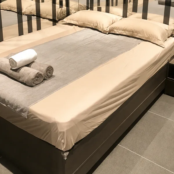 Simple waterbed room focused on practical setup and privacy photo