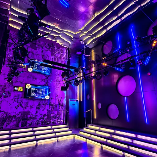 Neon entertainment room with stronger lighting and sound atmosphere photo