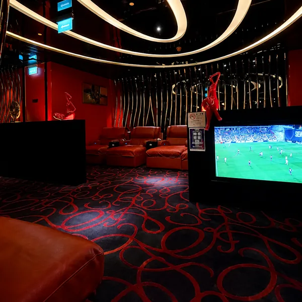 KTV media suite with screen and sofa zone photo