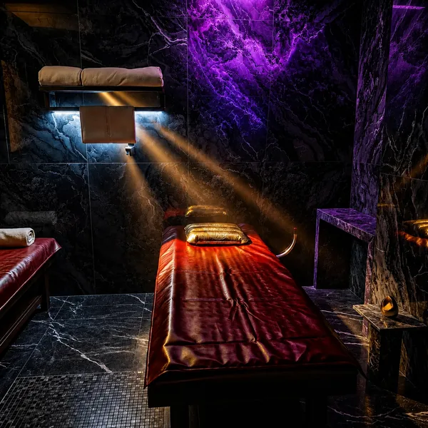 Red waterbed room under spotlight photo
