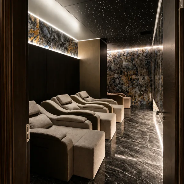 Dedicated recliner rest area with soft lighting for short naps or cooling down photo