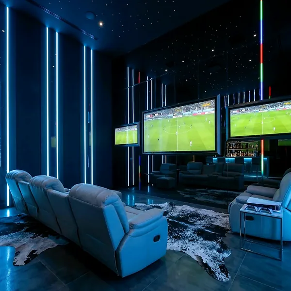 Sports TV lounge with recliners photo