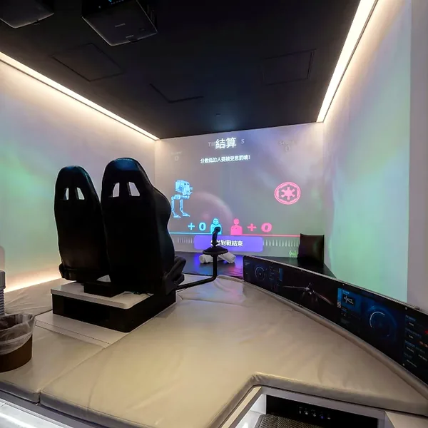 Racing simulator room with twin driver seats for a more interactive theme photo