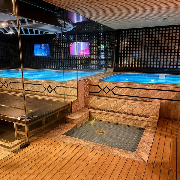 Wooden wet zone with pool photo